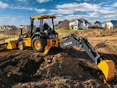 John Deere backhoe near new homes