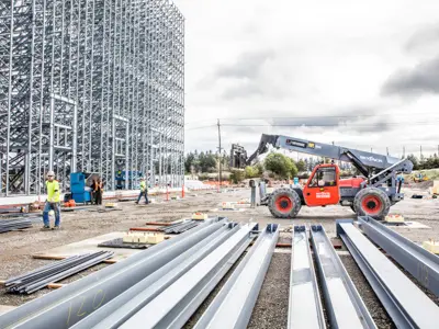 Telehandler at steel framing construction site