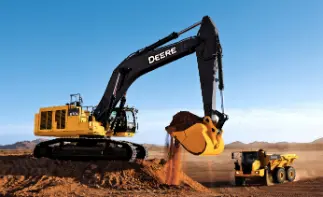 John Deere excavator loading dump truck