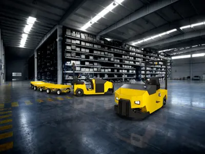 Yellow tow tractors in warehouse
