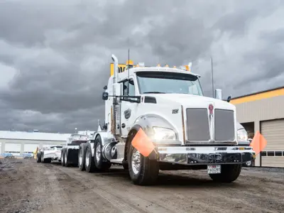 White semi truck under cloudy sky