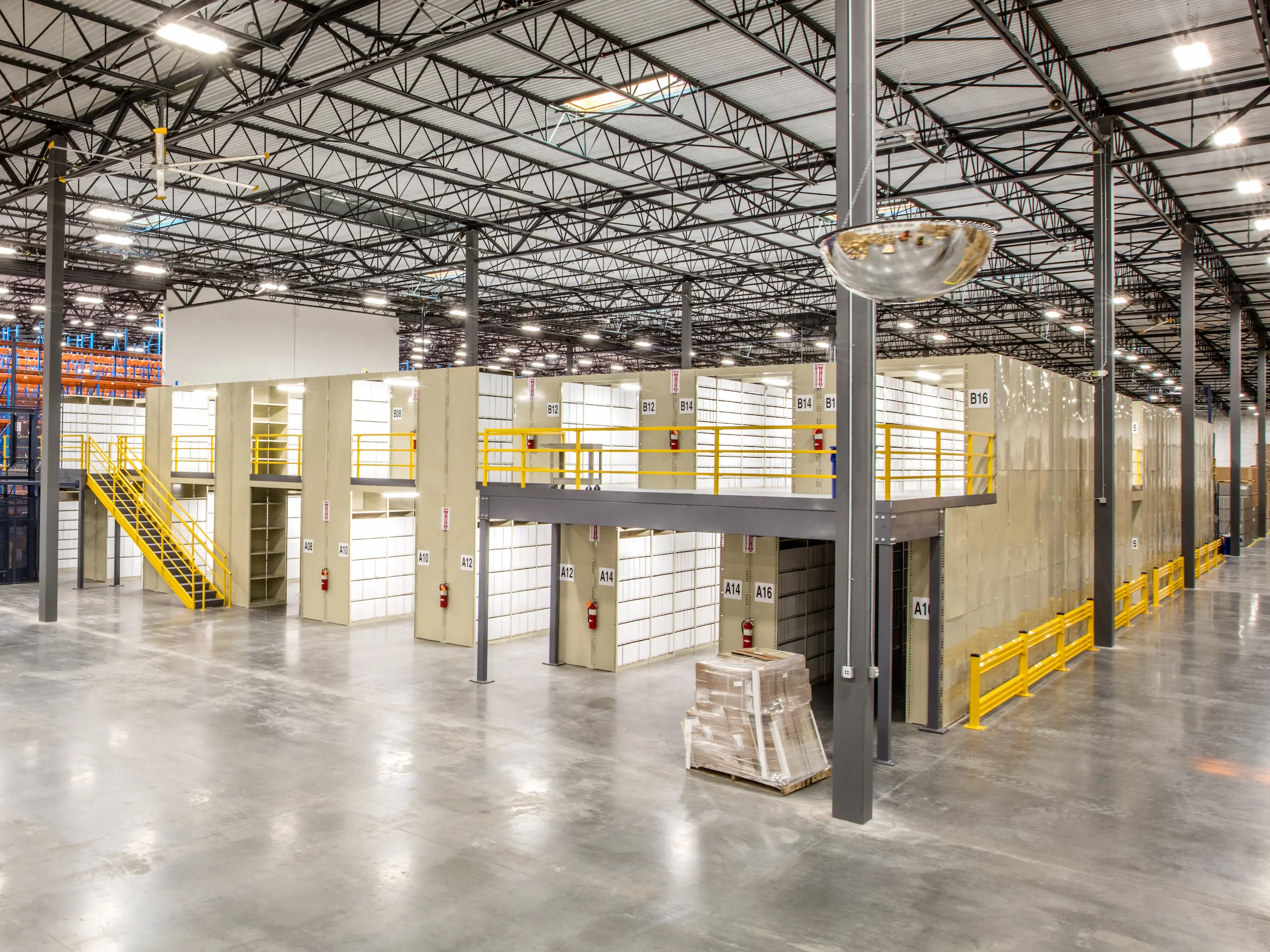 Two-level mezzanine storage inside warehouse